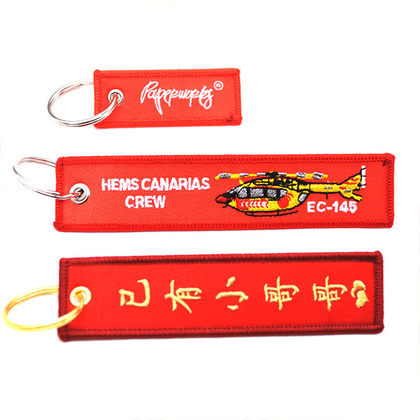 Custom Promotional Logo Cute Anime Remove Before Flight Crew Double Sided Woven Fabric Embroidery Key Jet Tag Keychain