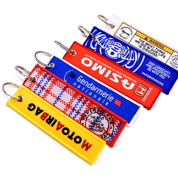 Custom Promotional Logo Cute Anime Remove Before Flight Crew Double Sided Woven Fabric Embroidery Key Jet Tag Keychain